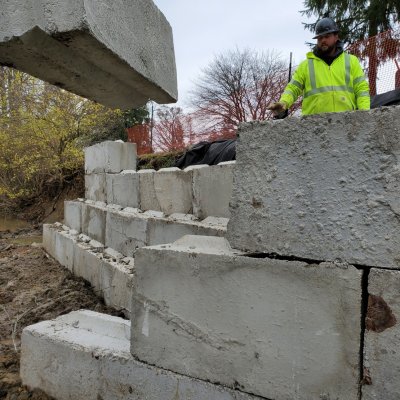 a man with concrete blocks